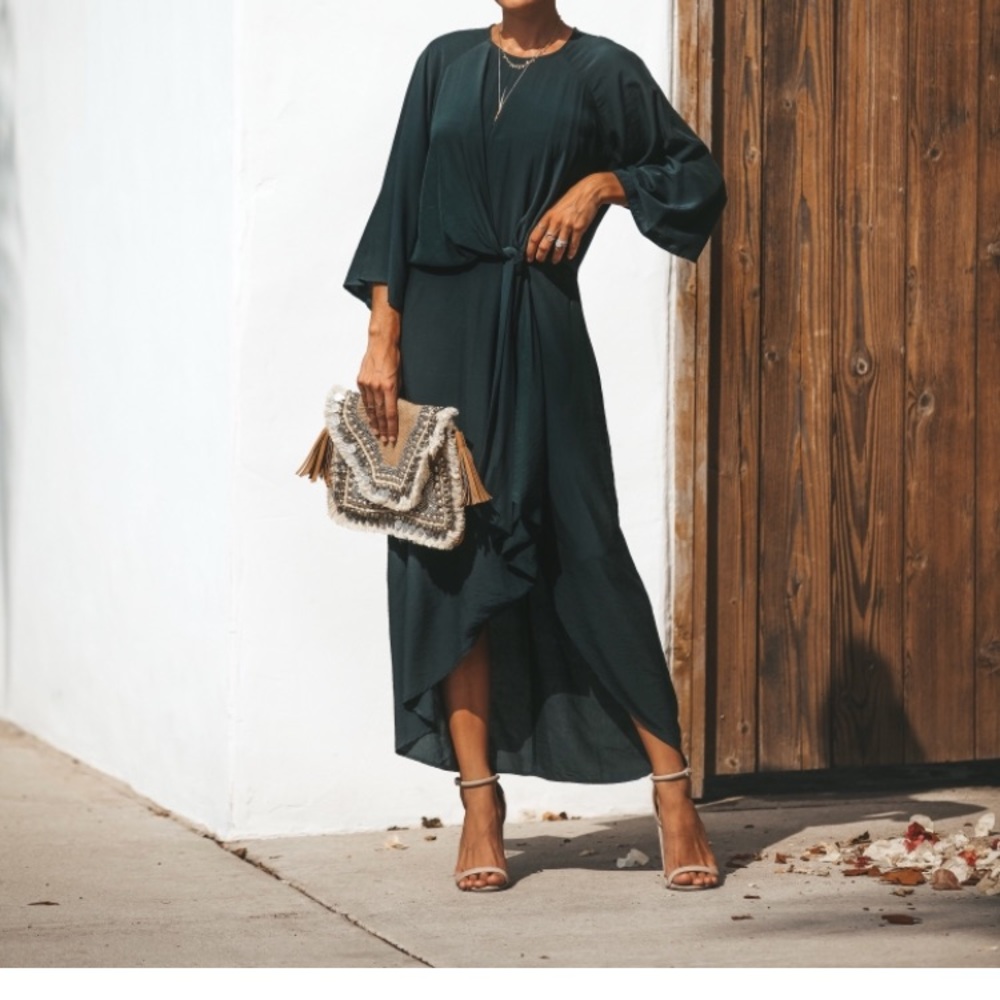 Chic About Town Twist Front Pocketed Dress